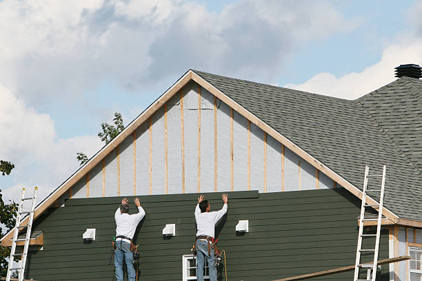 Professional Siding technician working in Olney, TX